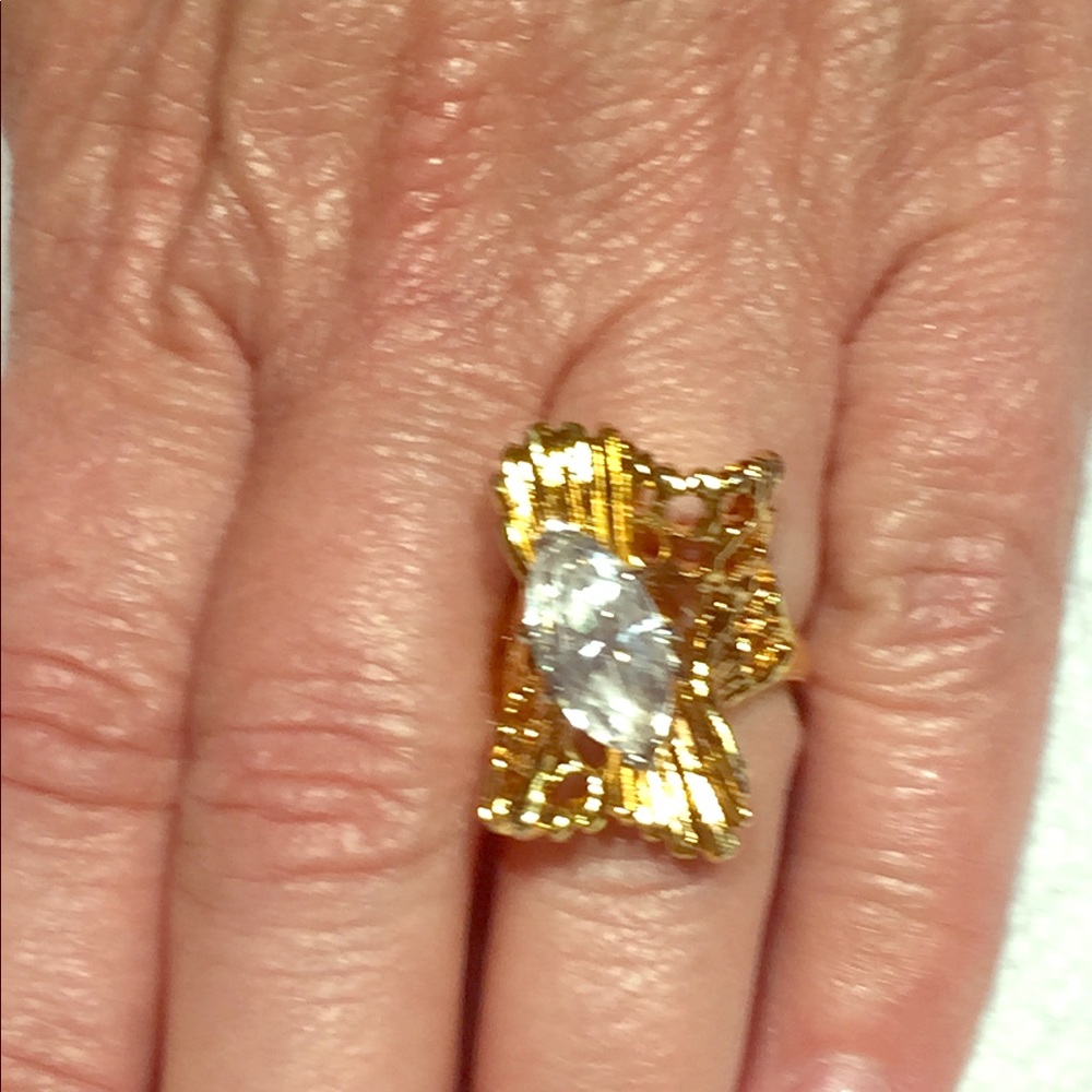 Woman’s cocktail ring, 14kt GF, 2.5 caret sparkling stone on unique setting